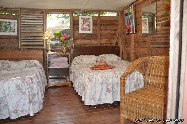 Secret Cabins At Firefly Beach Cottage Negril Esterno foto